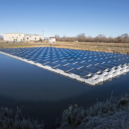 September 12, 2018 - The City of Walden, Johnson Controls, and GRID, celebrated the completion of a floating PV array on a Walden water retention pond at the City's water treatment facility in Walden, CO.  (Photo by Dennis Schroeder / NREL)